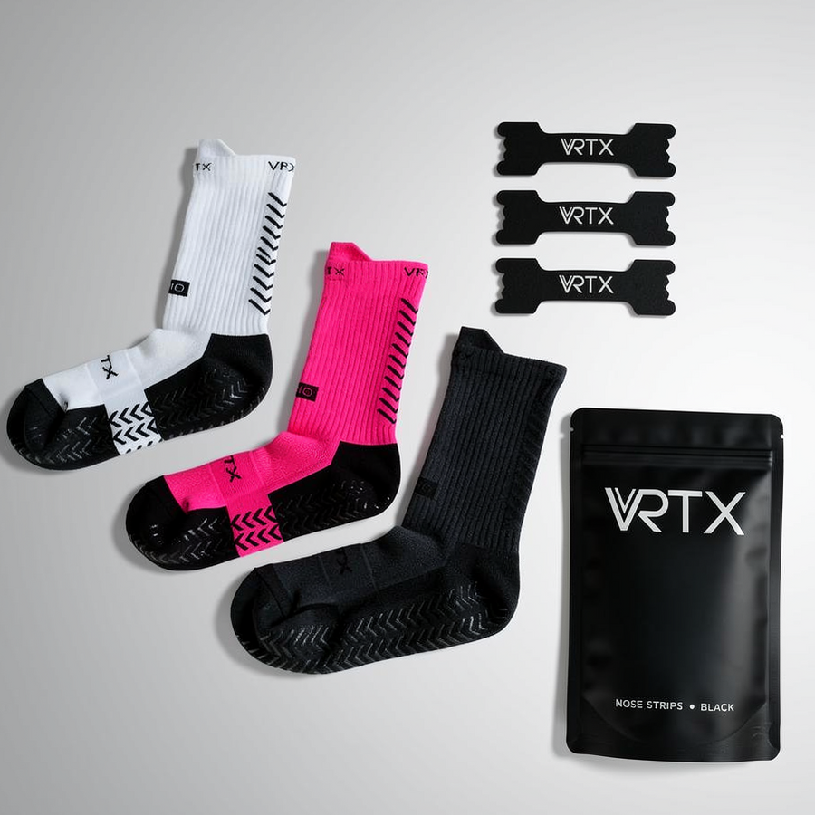 VRTX socks and nose strips on a gray background