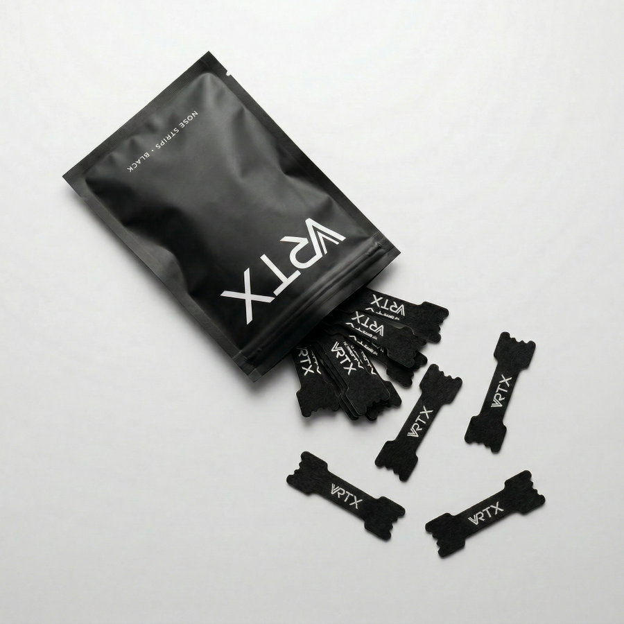 Black VRTX packaging with multiple small black nose strips on a light gray background